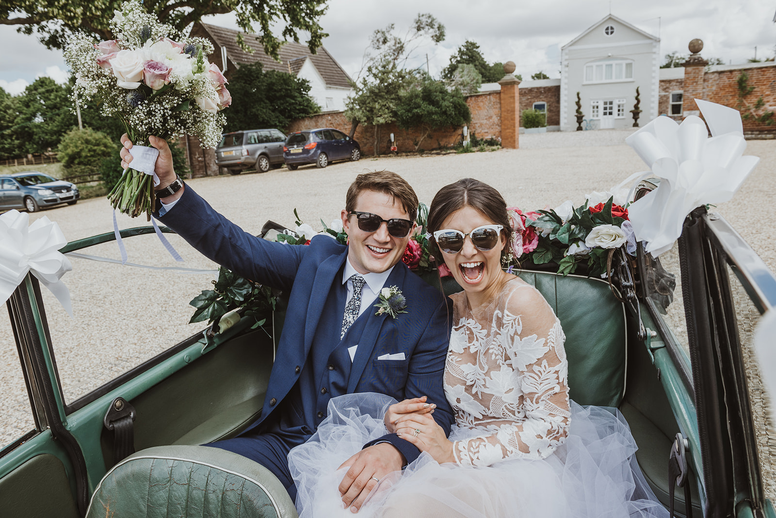 Happy newlyweds portrait at Pengethley Manor in Herefordshire by Birmingham wedding photography byGarazi